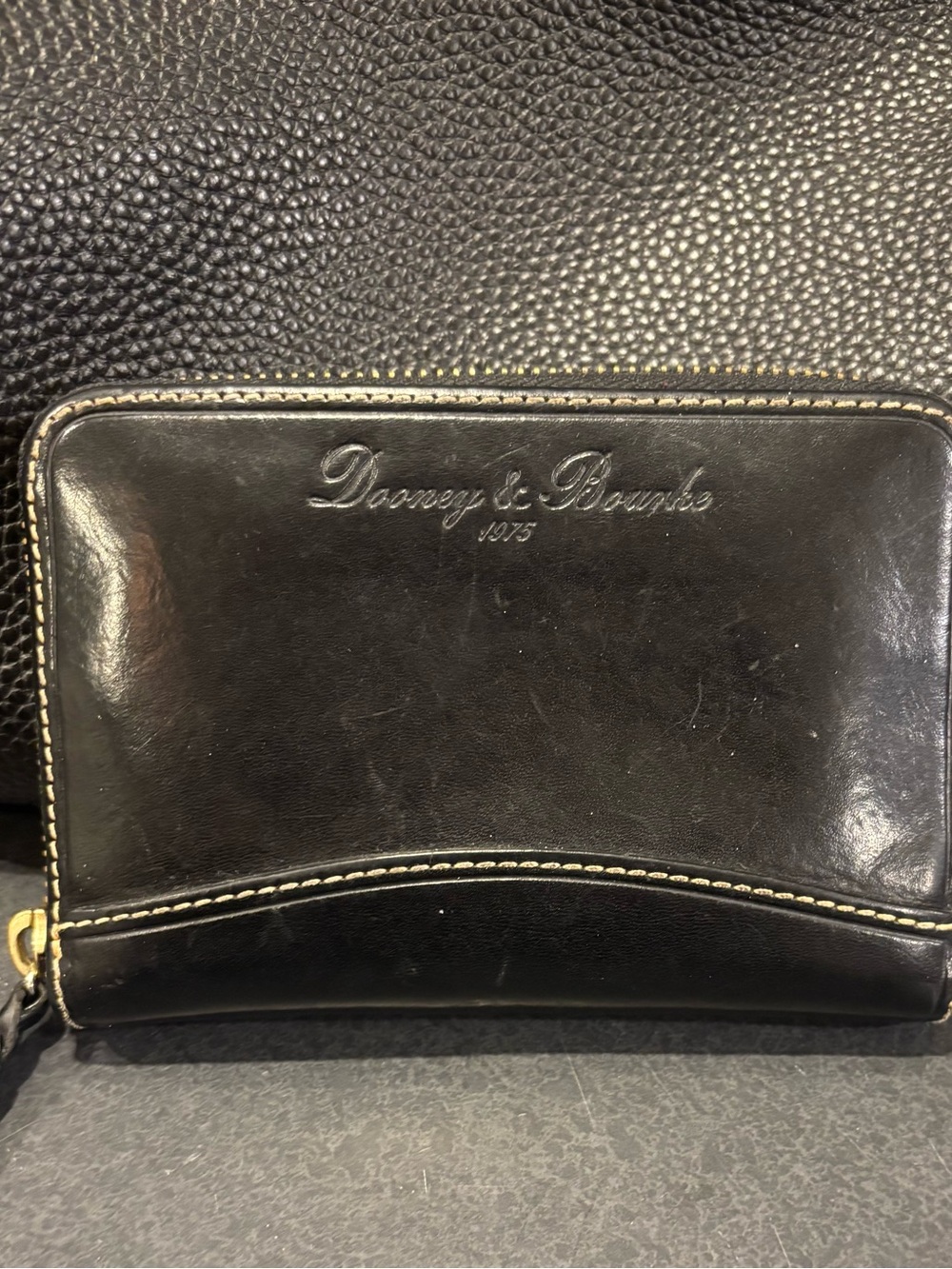 Dooney & Bourke Black Leather Zip-Around Wallet with Contrast Stitching